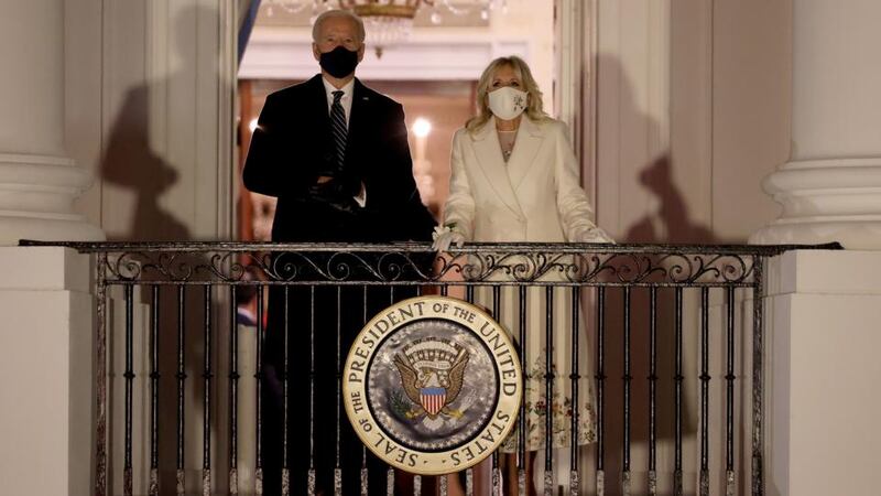 US president Joe Biden and first lady Dr Jill Biden prepare to watch fireworks at the White House. Photograph: Chip Somodevilla/Getty Images