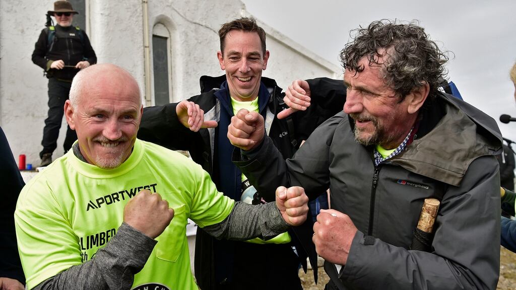 Climb with Charlie: Barry McGuigan, Ryan Tubridy and Charlie Bird on the summit of Croagh Patrick. Photograph: Conor McKeown
