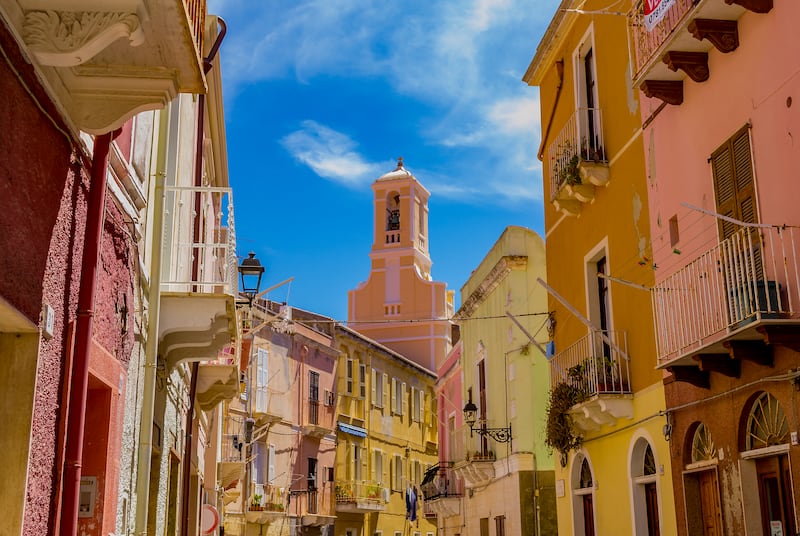 Palaces and a bell tower in Carloforte, Island of San Pietro, Carbonia-Iglesias, Sardinia. Photograph: Stefania Morelli/iStock