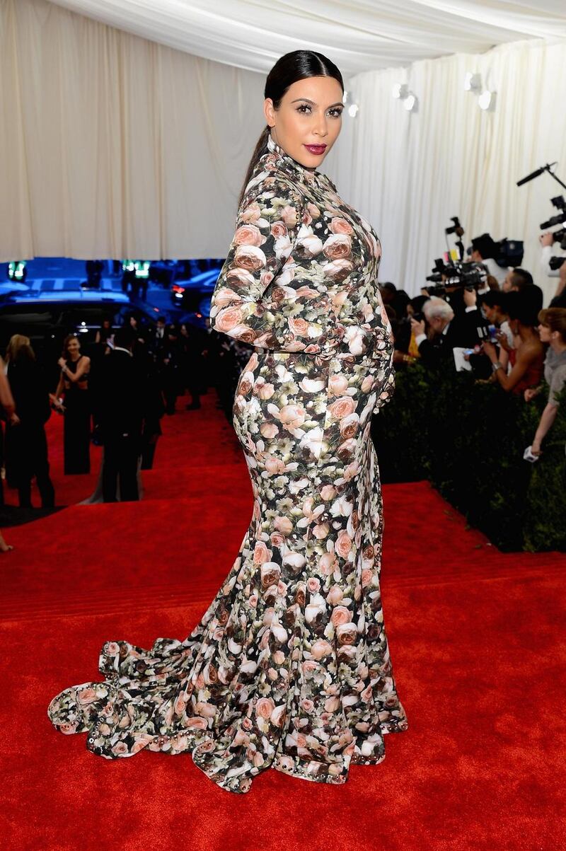 Kim Kardashian in her floral Givenchy dress. Photograph:  Larry Busacca/ Getty Images