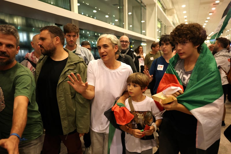 Former Barcelona mayor Ada Colau, who was sailing aboard a vessel in the Global Sumud Flotilla, leaves the city's airport after returning back her detention in Israel. Photograph: Lluis Gene/AFP via Getty