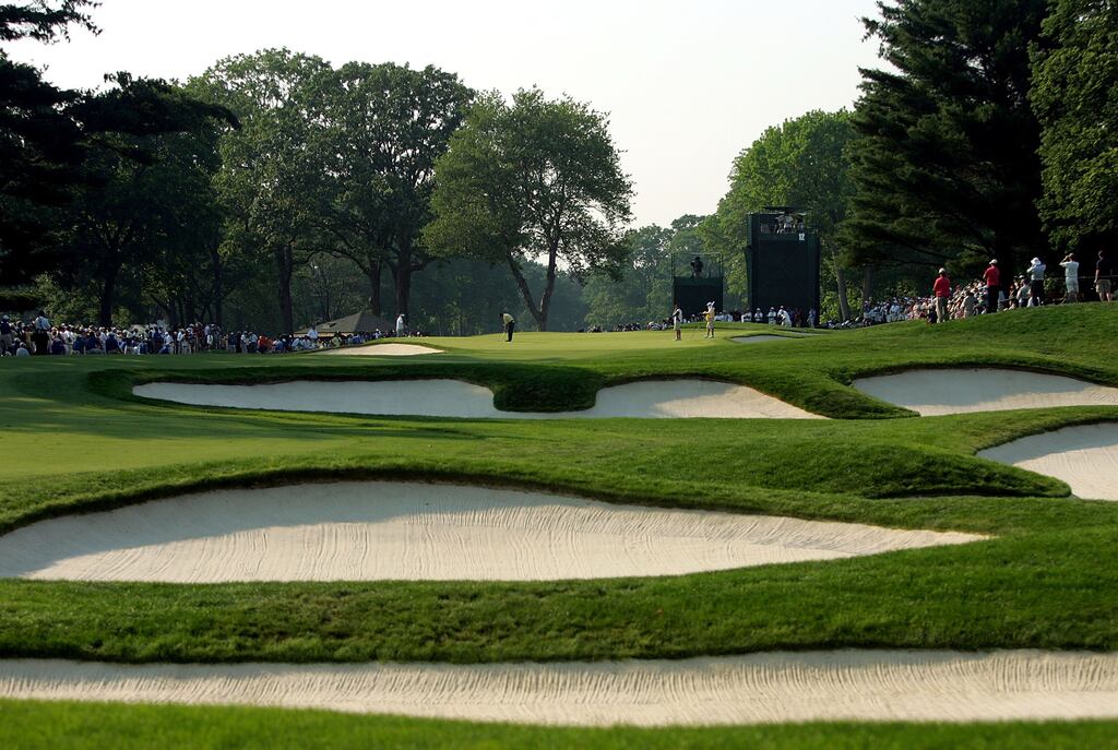 A view of the 12th hole as Phil Mickelson putts on the green during the final round of the 2006 US Open Championship at Winged Foot Golf Club in Mamaroneck, New York. Photograph: Ezra Shaw/Getty Images