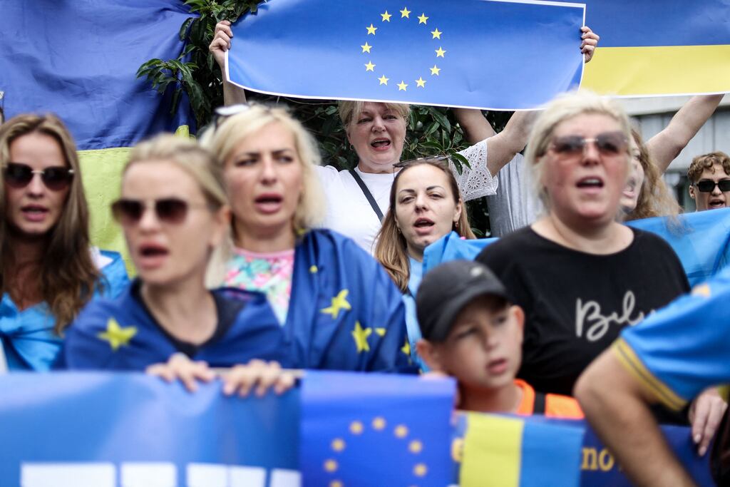 Demonstrators gather outside the European Headquarters as they protest in support of Ukraine's application for EU candidacy on Thursday. Photograph: KENZO TRIBOUILLARD/AFP via Getty Images