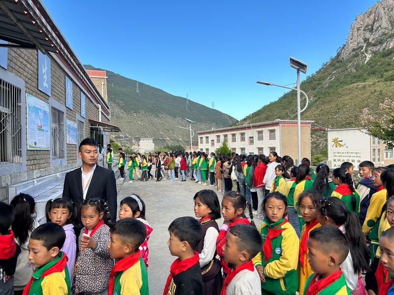 Children queuing for dinner at Shangri-La Key Boarding School. Photograph: Denis Staunton