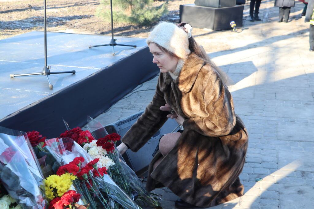 A relative lays flowers at the monument in Kyiv to mark the victims of Flight 752 of Ukraine International Airlines which was brought down by an Iranian missile shortly after takeoff in Tehran on January 8th, 2020, killing all 176 people on board. Photograph: Talha Yavuz/Anadolu Agency via Getty Images