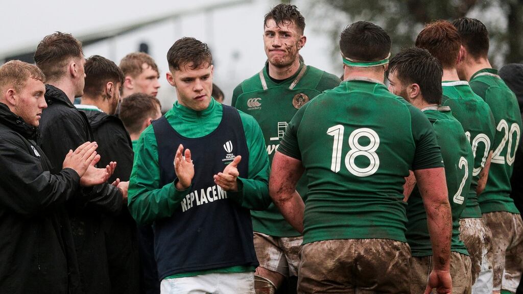 Ireland Under-20 players dejected after their defeat to England. Photograph: Pablo Gasparini/Inpho