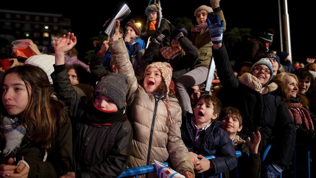 Children reacting during the ‘Three Kings’ parade in Madrid on Tuesday. Photograph: Pablo Blazquez Dominguez/Getty Images