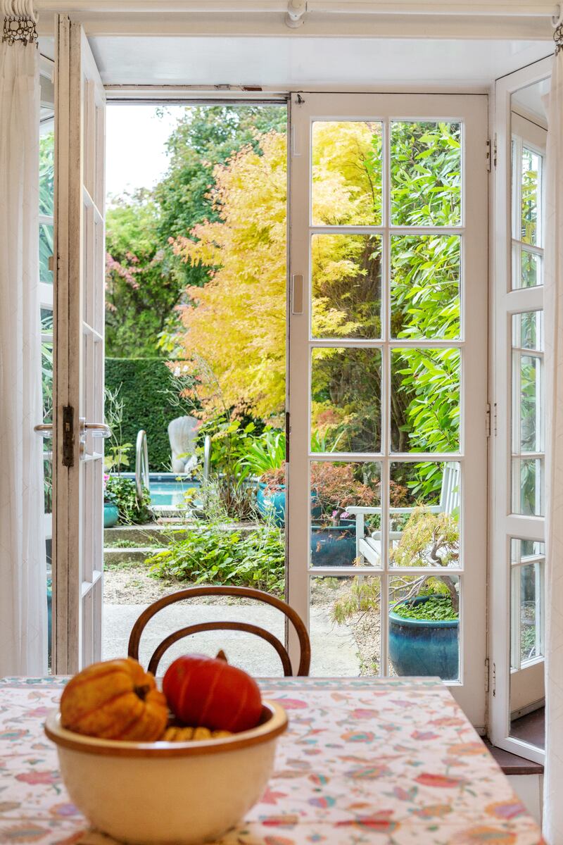 The kitchen opens to the garden