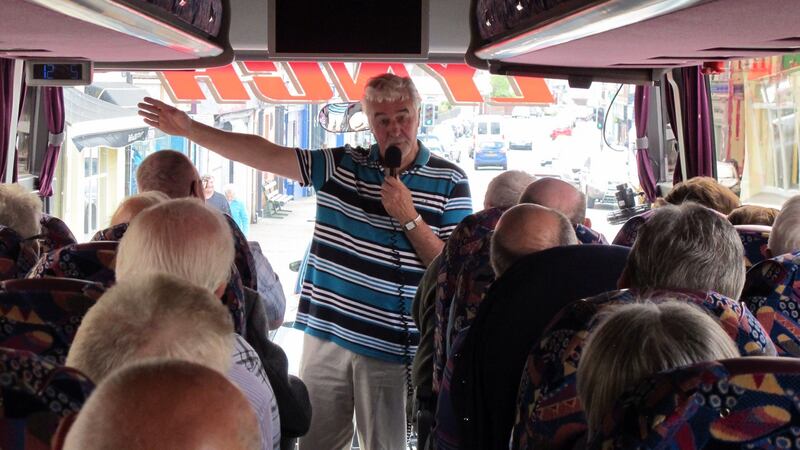 Eric Brown addressing more than 40 members of Castlederg Ulster Defence Association during a bus tour of Co Fermanagh.