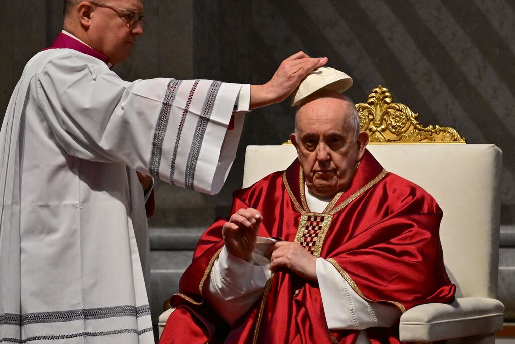 Pope Francis presides over the Passion of the Lord mass on Good Friday at St Peter's basilica in The Vatican. Photograph: Tiziana Fabi/AFP/Getty