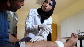 Tripoli hospital struggles with influx of Syrian fighters