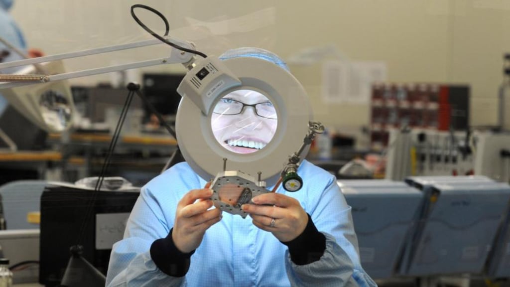 A worker at the Andor Technology factory in Belfast. The firm is actively seeking 18 voluntary redundancies at its Belfast operations. Photograph: Charles McQuillan/Pacemaker