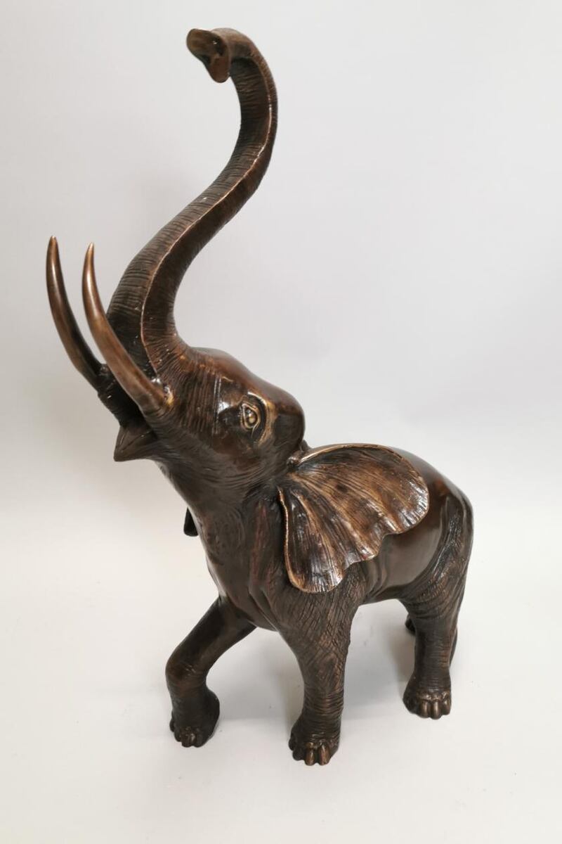 Cast bronze elephant, €500-800.