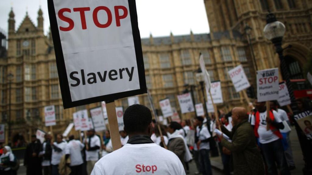 Anti-slavery activists rally outside parliament yesterday in London. Photograph: Peter Macdiarmid/Getty Images.