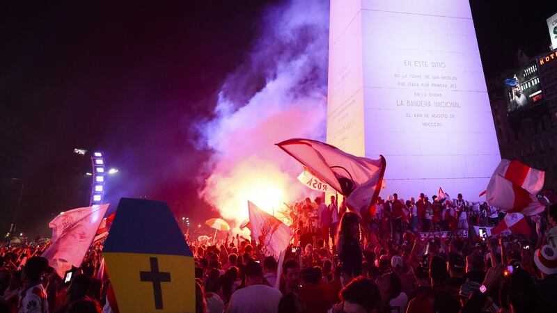 River fans – with a Boca Juniors coffin – celebrate in Buenos Aires. Photo: Marcelo Endelli/Getty Images
