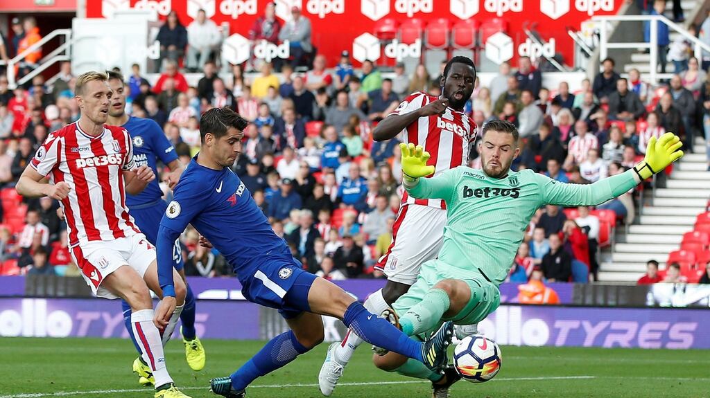 Chelsea’s Alvaro Morata scores his side’s fourth goal to complete his hat-trick against Stoke City. Photograph: Andrew Yates/Reuters