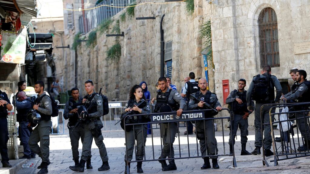 Israeli police secure the area near the scene of the shooting attack in Jerusalem’s Old City on Friday. Photograph: Ammar Awad/Reuters