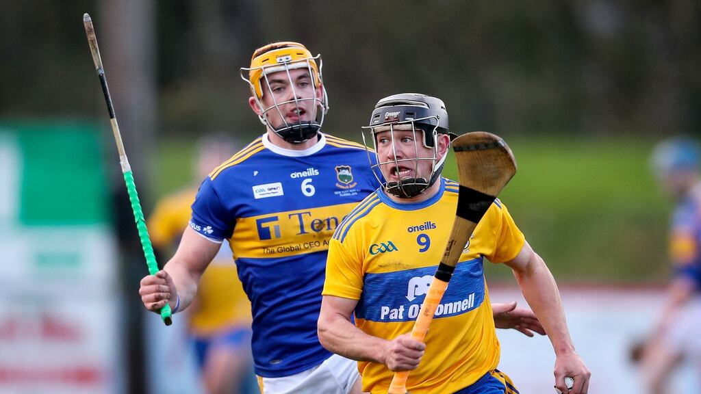 Tipperary’s Ronan Maher tries to chase down Clare’s David Reidy. Photograph: Oisin Keniry/Inpho