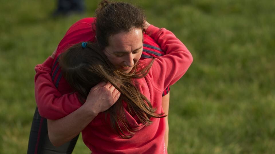 Michelle O’Hora is congratulated by her daughter, Milly, after completing the parkrun in Westport, Co Mayo. Photograph: Keith Heneghan