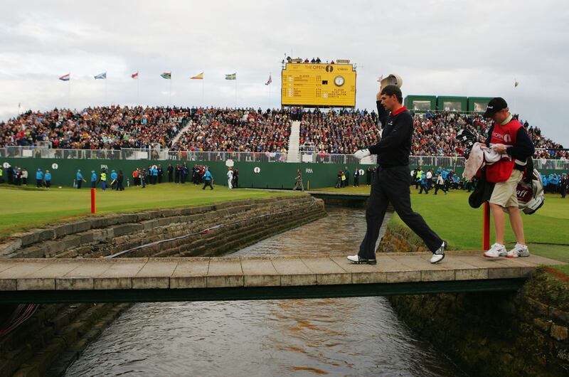 Pádraig Harrington with his caddie Ronan Flood on the final playoff hole during the final round of The 136th Open Championship at Carnoustie. Photograph: Andy Lyons/Getty Images