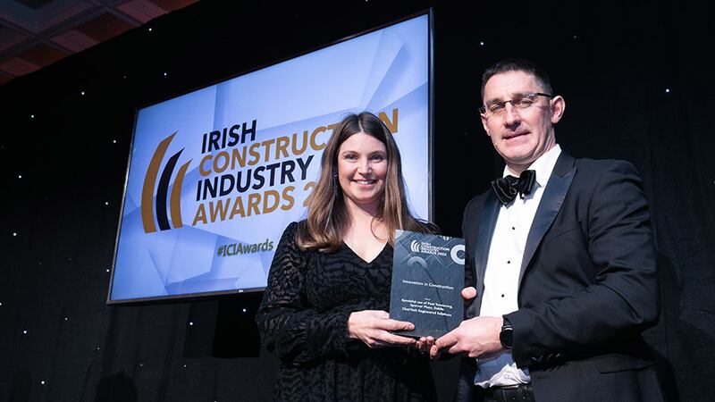 Jane Larmour, Awards Judge, presents the Innovation in Construction award to Feargal Cleary, ClearTech Engineered Solutions.