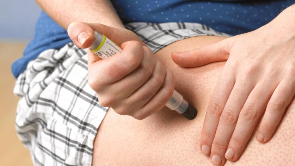 Teenager injecting with Epipen after an attack. Photograph: Getty Images