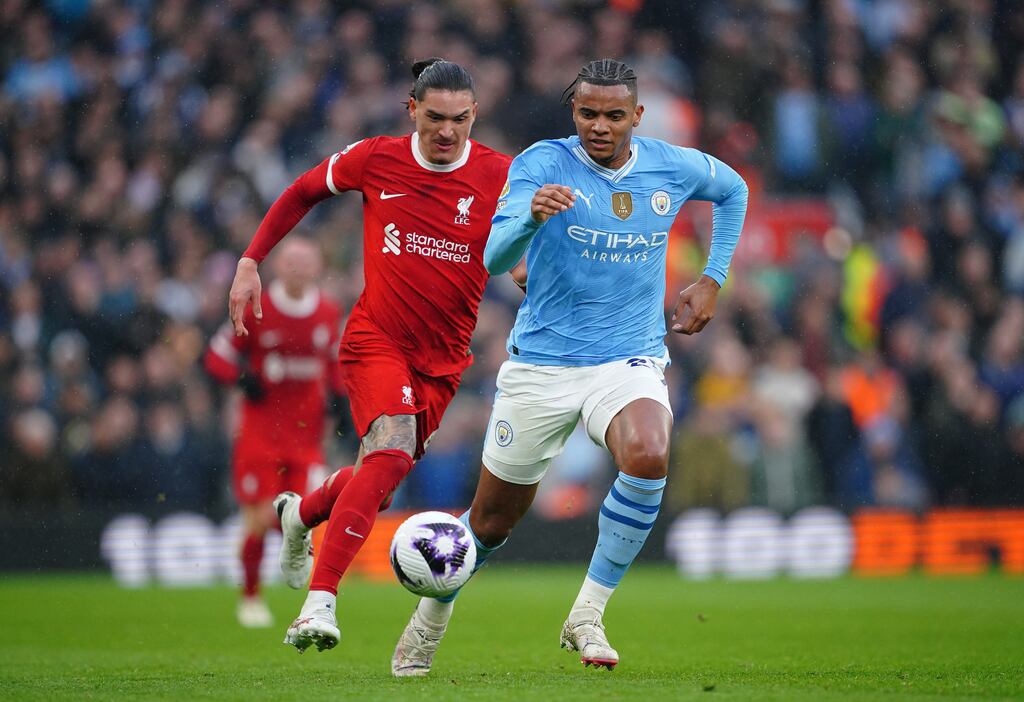 Liverpool's Darwin Nunez and Manchester City's Manuel Akanjin during their Premier League match at Anfield, Liverpool, on Sunday. Photograph: Peter Byrne/PA Wire