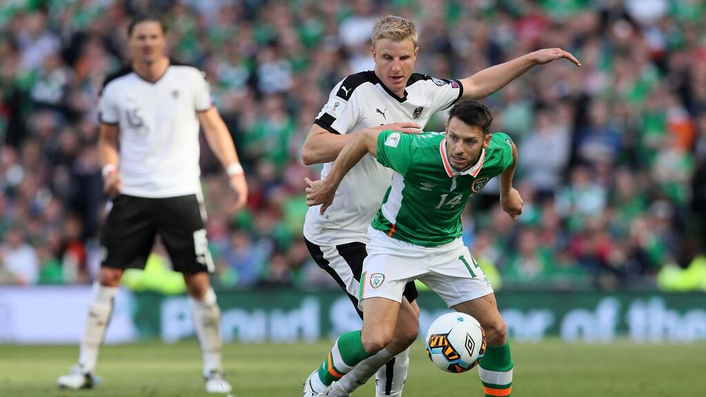 Republic of Ireland’s Wes Hoolahan and Austria’s Martin Hinteregger battle for the ball during Sunday’s World Cup Group D qualifier at the Aviva Stadium. Photograph: Brian Lawless/PA Wire