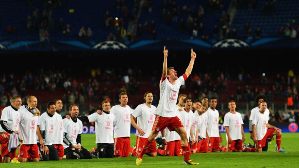 Thomas Muller leads his Bayern Munich team-mates in celebrations in front of their fans following their victory over Barcelona in the Champions League semi-final second leg at Camp Nou. Photograph: Mike Hewitt/Getty Images