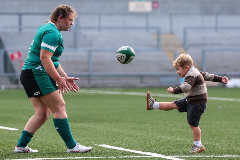 Ireland's Ellena Perry with her son Bert after making her debut in the warm-up game against Canada. Photograph: Ben Brady/Inpho