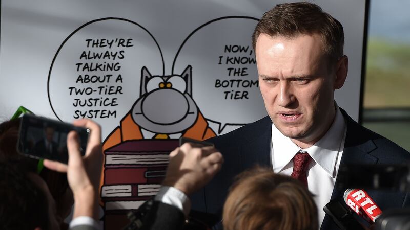 A file image of Russian opposition leader Alexei Navalny speaking to reporters. Photograph: AFP