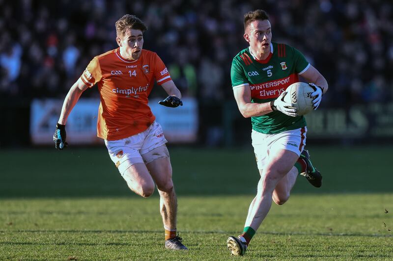 Armagh's Andrew Murnin and Mayo's Stephen Coen in action during the AFL clash at the Athletic Grounds, Armagh. Photograph: John McVitty/Inpho