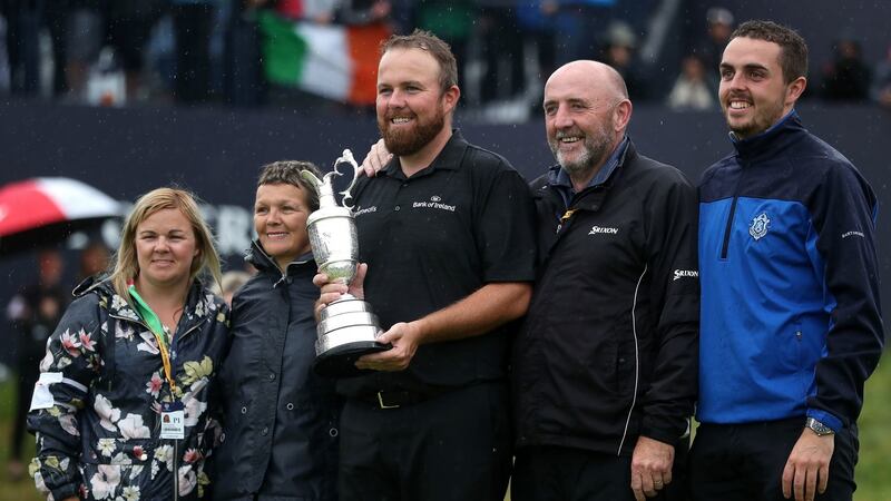 Shane Lowry celebrates with his family after being presented with the Claret Jug after winning the British Open at Royal Portrush. Photograph: David Davies/PA Wire