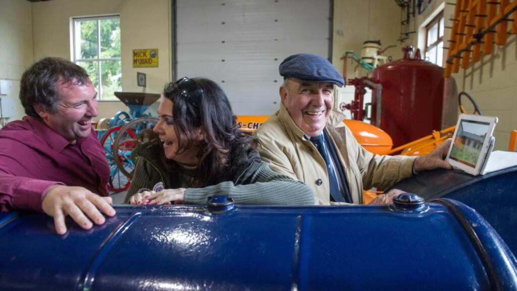 Mens Sheds ‘Shed Crawl’ lands in Moynalty, Co Meath. Pictured in the Moynalty Steam Threshing Museum with a fully restored Fordson tractor from left: John Evoy of the Irish Men’s Sheds Association, Ciara O’Toole of Social Entrepreneurs Ireland (SEI) and Jimmy Carroll from Delgany, County Wicklow. Photograph: Barry Cronin