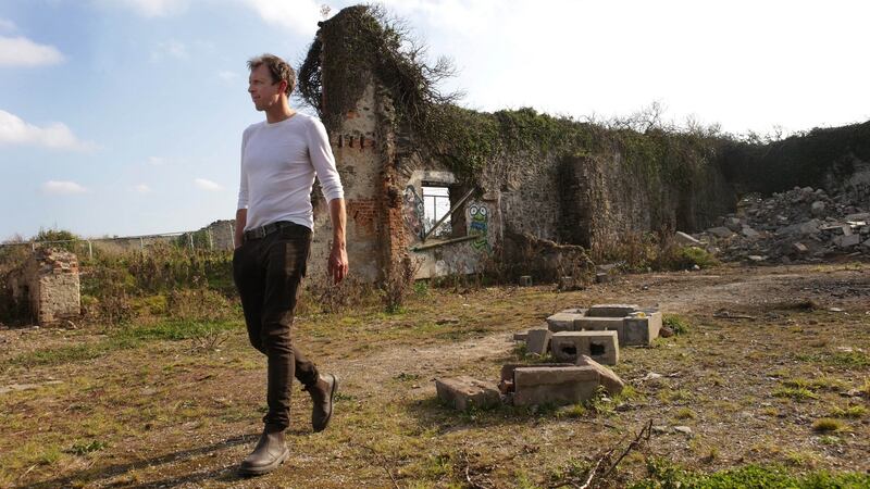 Darragh McCullough beside the old buildings where he discovered a group of people having a party in north Co Dublin. Photograph: Damien Eagers