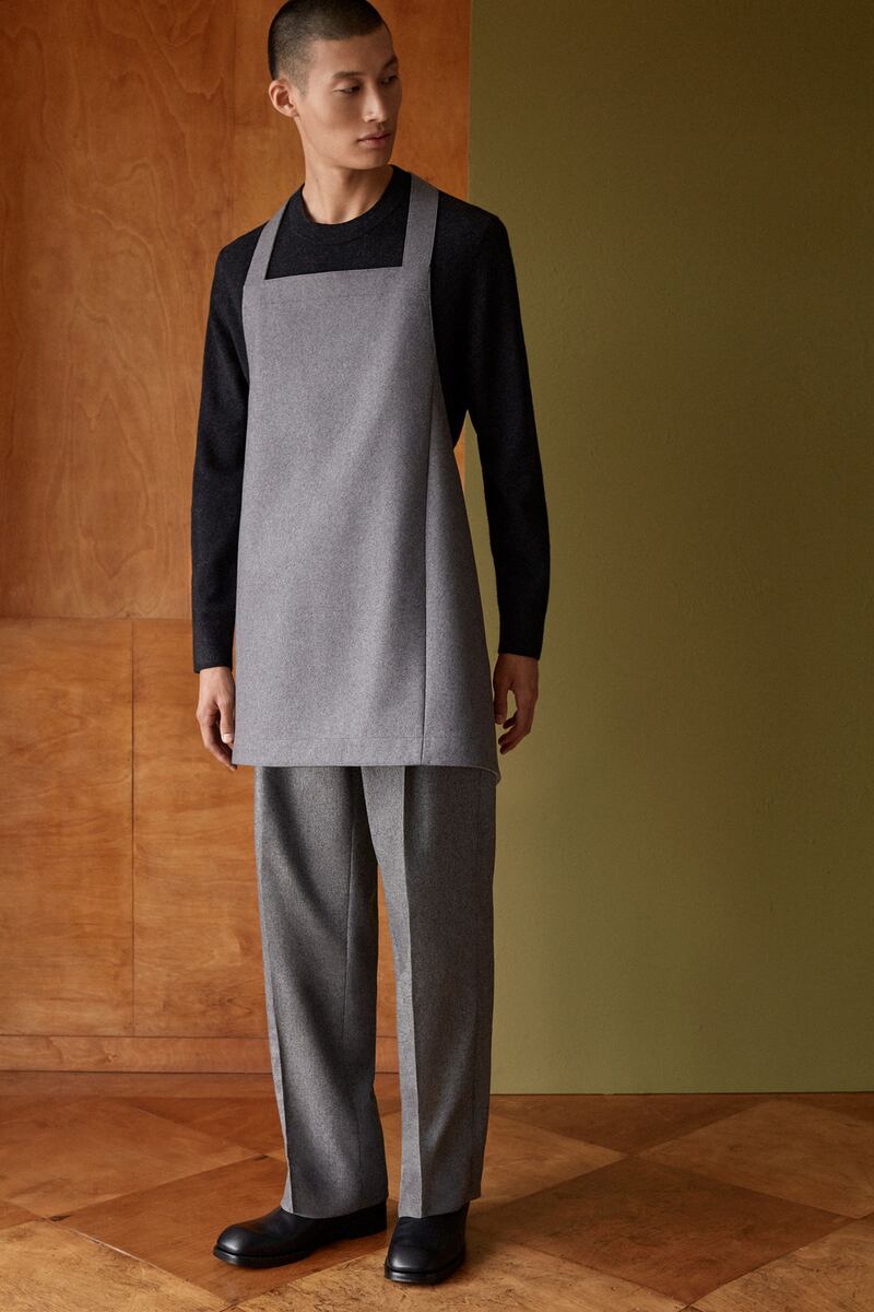 Grey apron in pure Italian wool, €99, high-waisted wool trousers, €89, and mercerised jersey T-shirt, €29