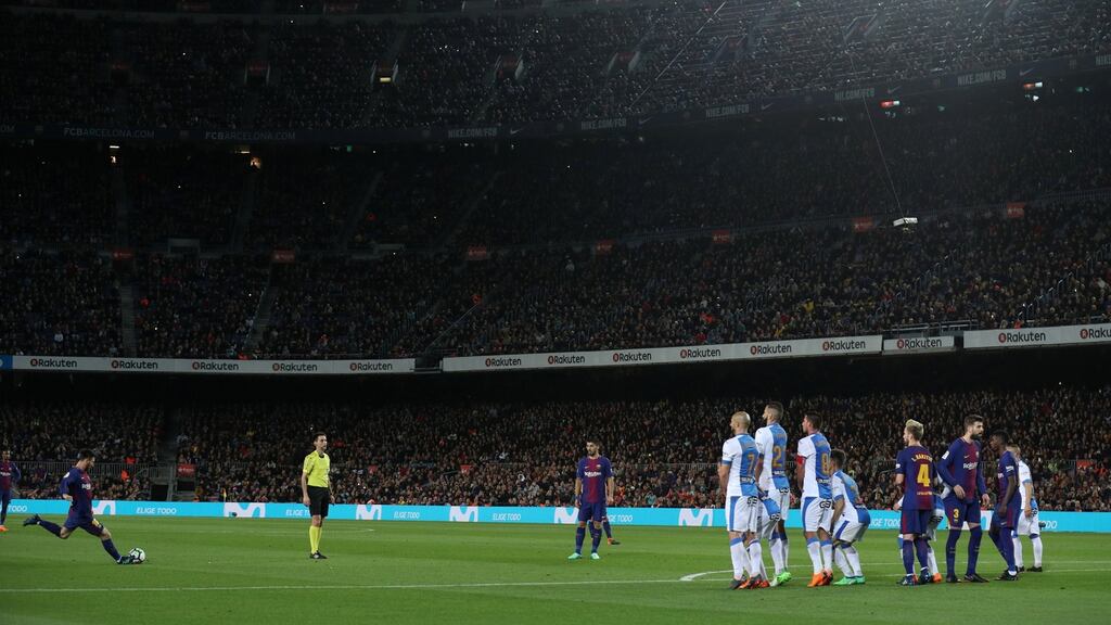 Barcelona’s Lionel Messi scores his first goal with a free-kick in the La Liga game against Leganes at the Camp Nou. Photograph: Albert Gea/Reuters