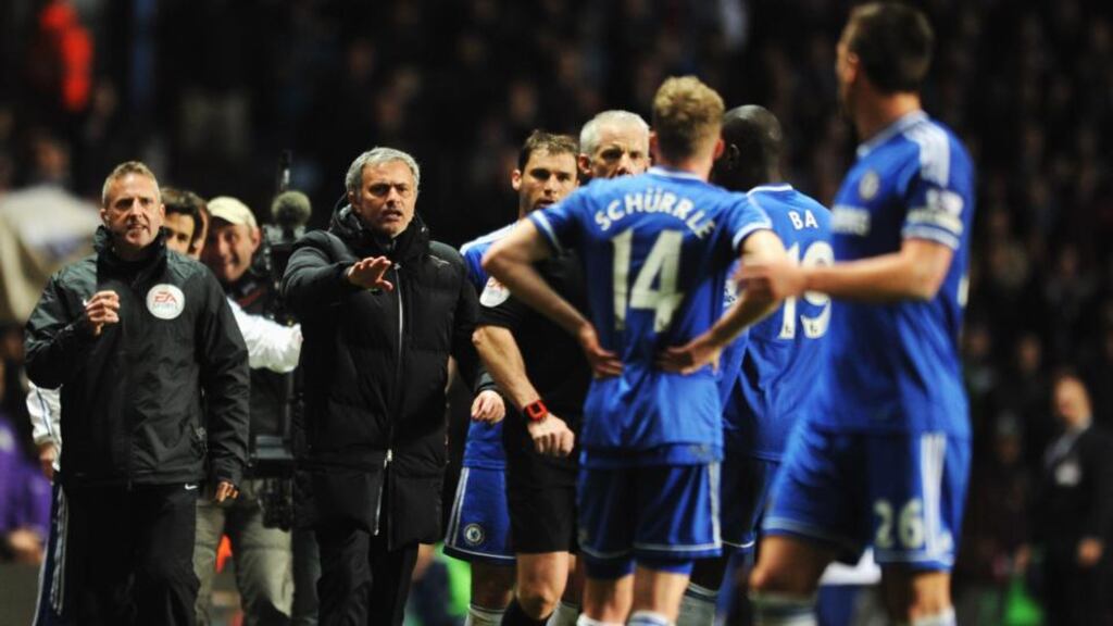 Jose Mourinho protests to referee Chris Foy during the Barclays Premier League match between Aston Villa and Chelsea at Villa Park. Photograph: Chris Brunskill/Getty Images