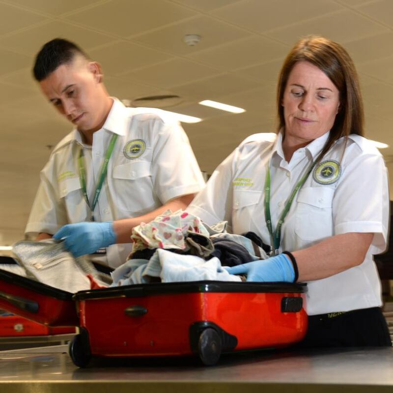 Dublin Airport: Ian Murphy and Ann Wright of the search unit. Photograph: Dara Mac Dónaill