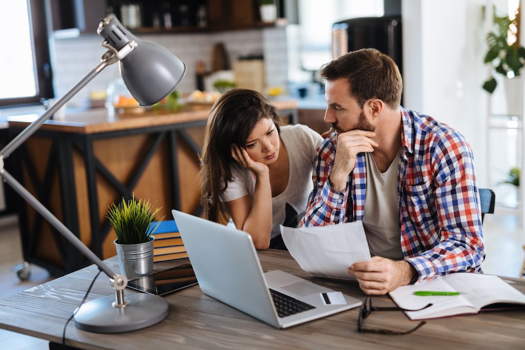 A couple check their household bills. Photograph: Emir Memedovski/Getty Images