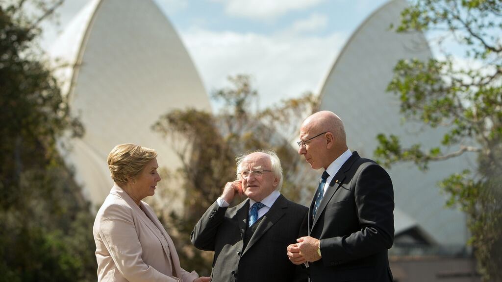 President Michael D Higgins talks with New South Wales’ Governor David Hurley as they walk in the garden with Frances Fitzgerald at Government House in Sydney. Photograph: Steve Christo/Getty Images