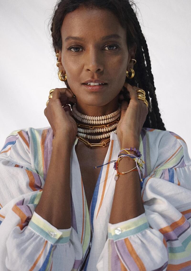 Striped dress €29.99, hoop earring €9.99, rings and string bracelet €14.99 all by LemLem by Liya Kebede for H+M
