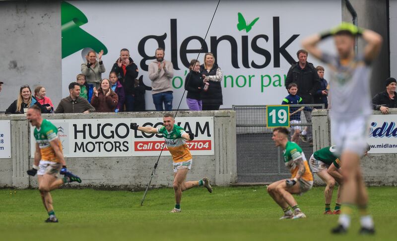 Delighted Offaly players celebrate the victory over Meath at O'Connor Park, Tullamore. Photograph: Evan Treacy/Inpho