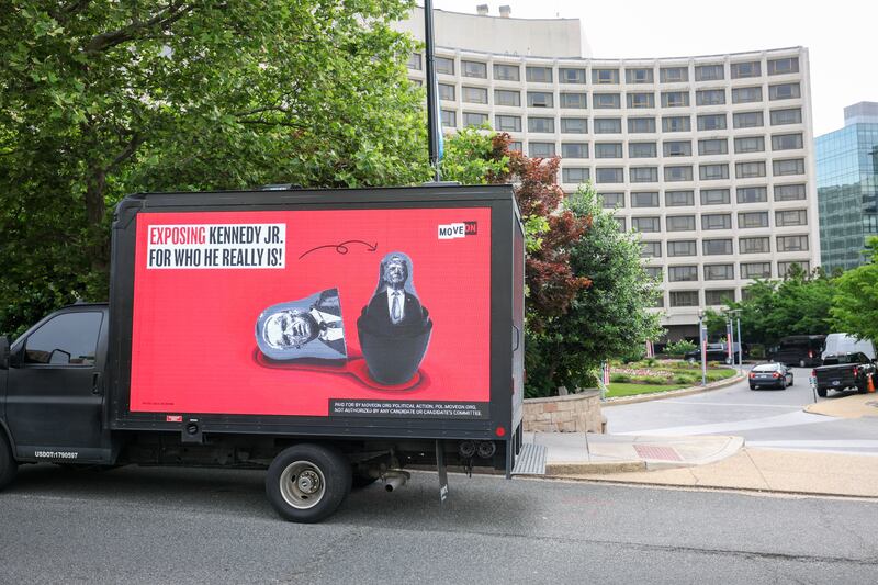 One of the mobile screens showing messages aimed at Kennedy outside the Washington DC Hilton hotel during the Libertarian convention. Photograph: Tasos Katopodis/Getty Images for MoveOn