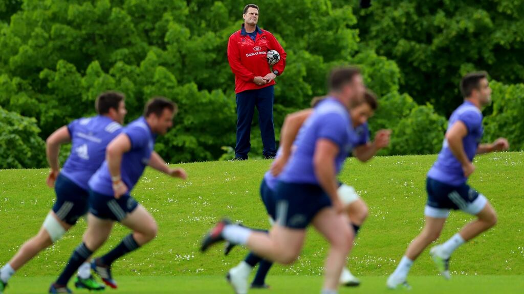 Director of rugby Rassie Erasmus casts an eye on Munster training at the University of Limerick. Photograph: James Crombie/Inpho