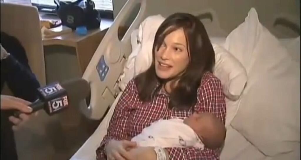 Polly McCourt in hospital in New York with her newborn baby girl Ila.