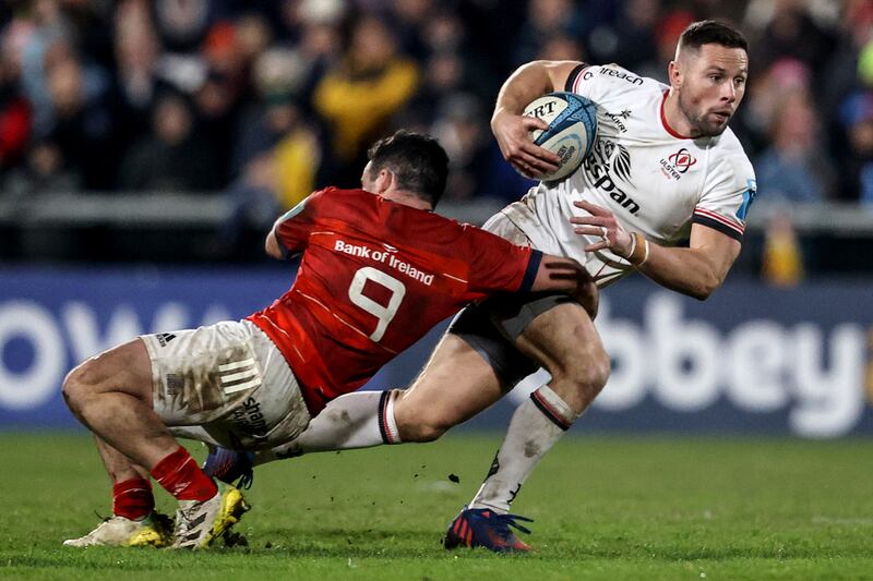Munster's Paddy Patterson tackles John Cooney of Ulster. Photograph: Ben Brady/Inpho