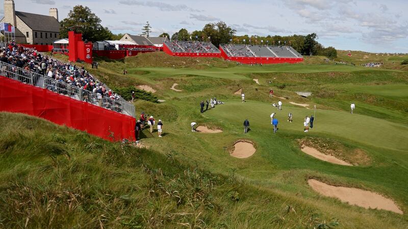 Seven Mile Creek and a series of narrow sand bunkers line the right side of the hump-backed ninth green green at Whistling Straits. Photograph: Richard Heathcote/Getty Images
