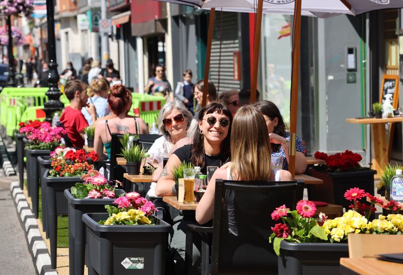 Outdoor diners enjoy food and drink on the footpath on Capel Street during summer 2021. Photograph: Alan Betson/The Irish Times