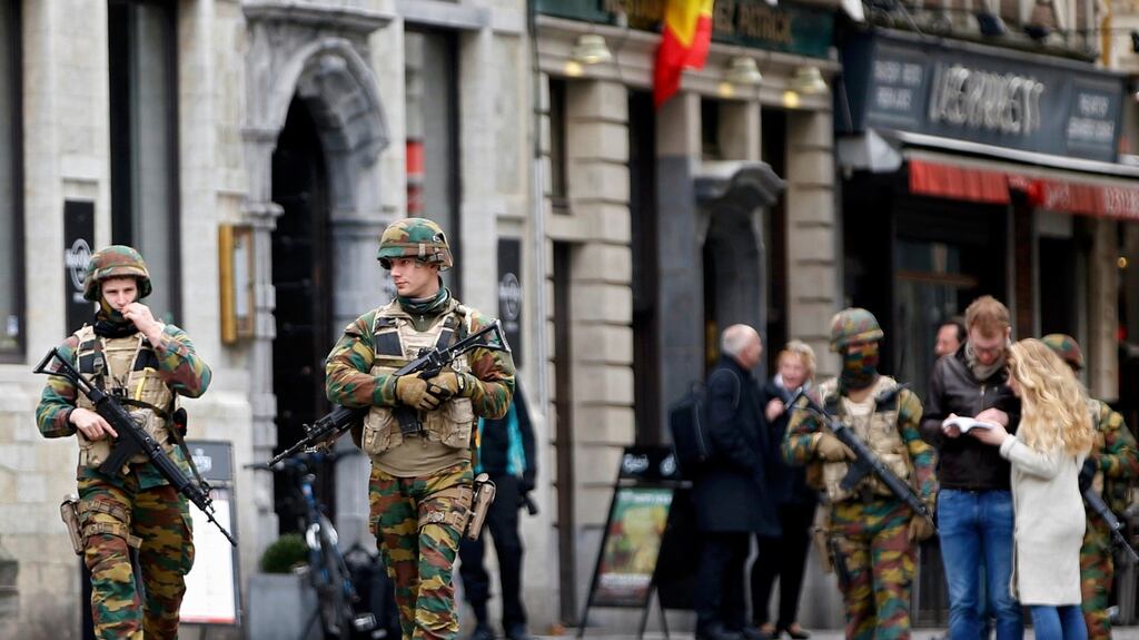 Belgian soldiers patrol in the Grand Place of Brussels following Tuesday's bombings in Brussels , Belgium, March 24, 2016. REUTERS/Charles Platiau